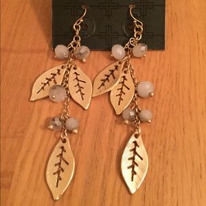 Dangly leaf cut-out and bead earrings